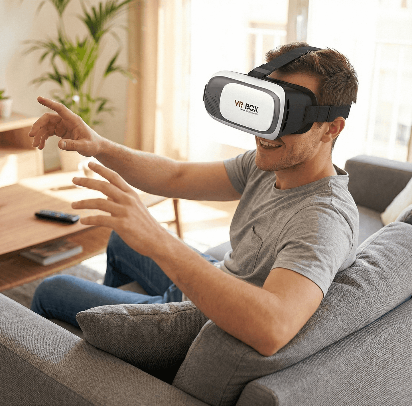A person enjoying a virtual experience with 3D VR Box Virtual Reality Glasses in a cozy living room.