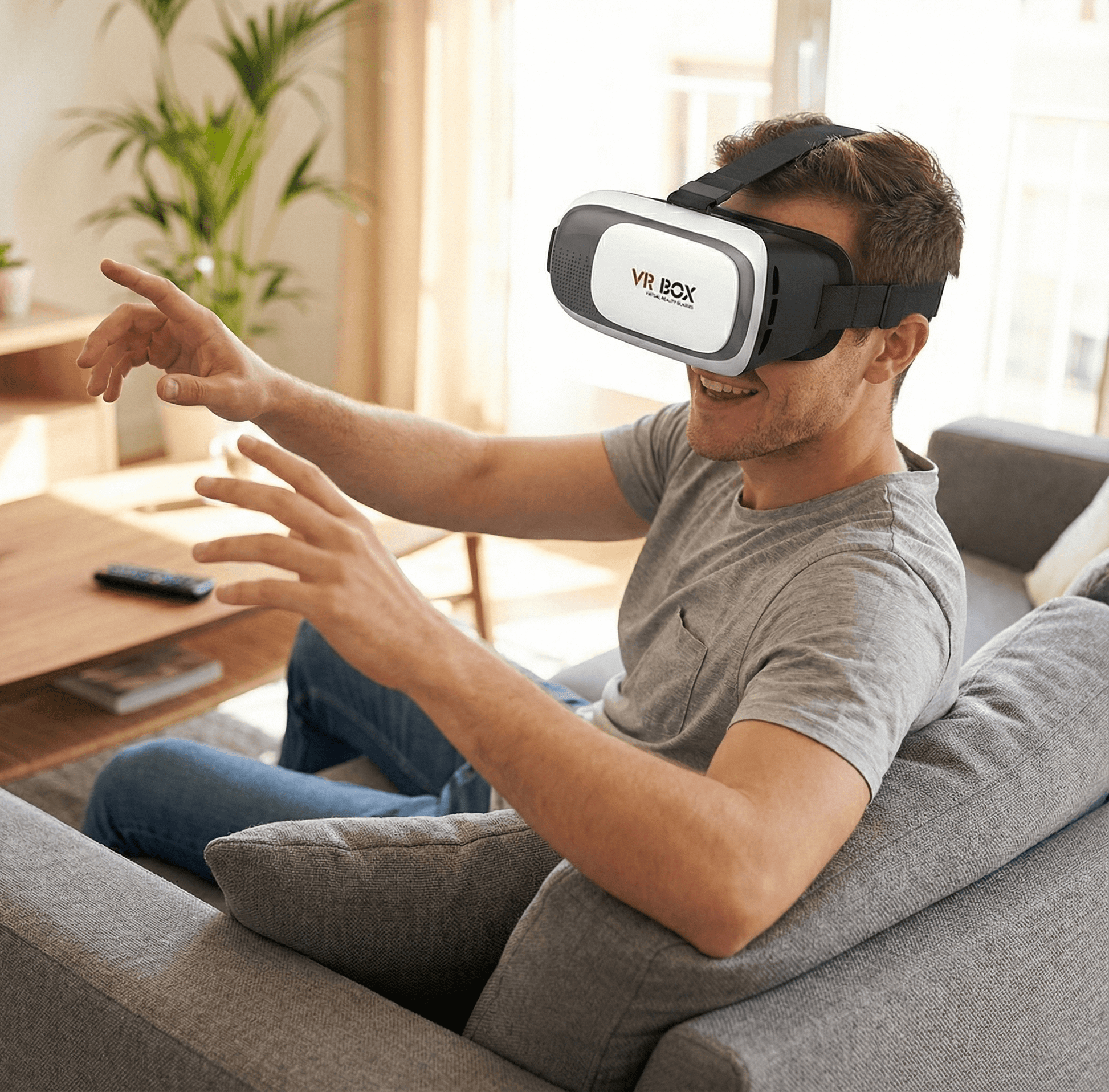 A person enjoying a virtual experience with 3D VR Box Virtual Reality Glasses in a cozy living room.
